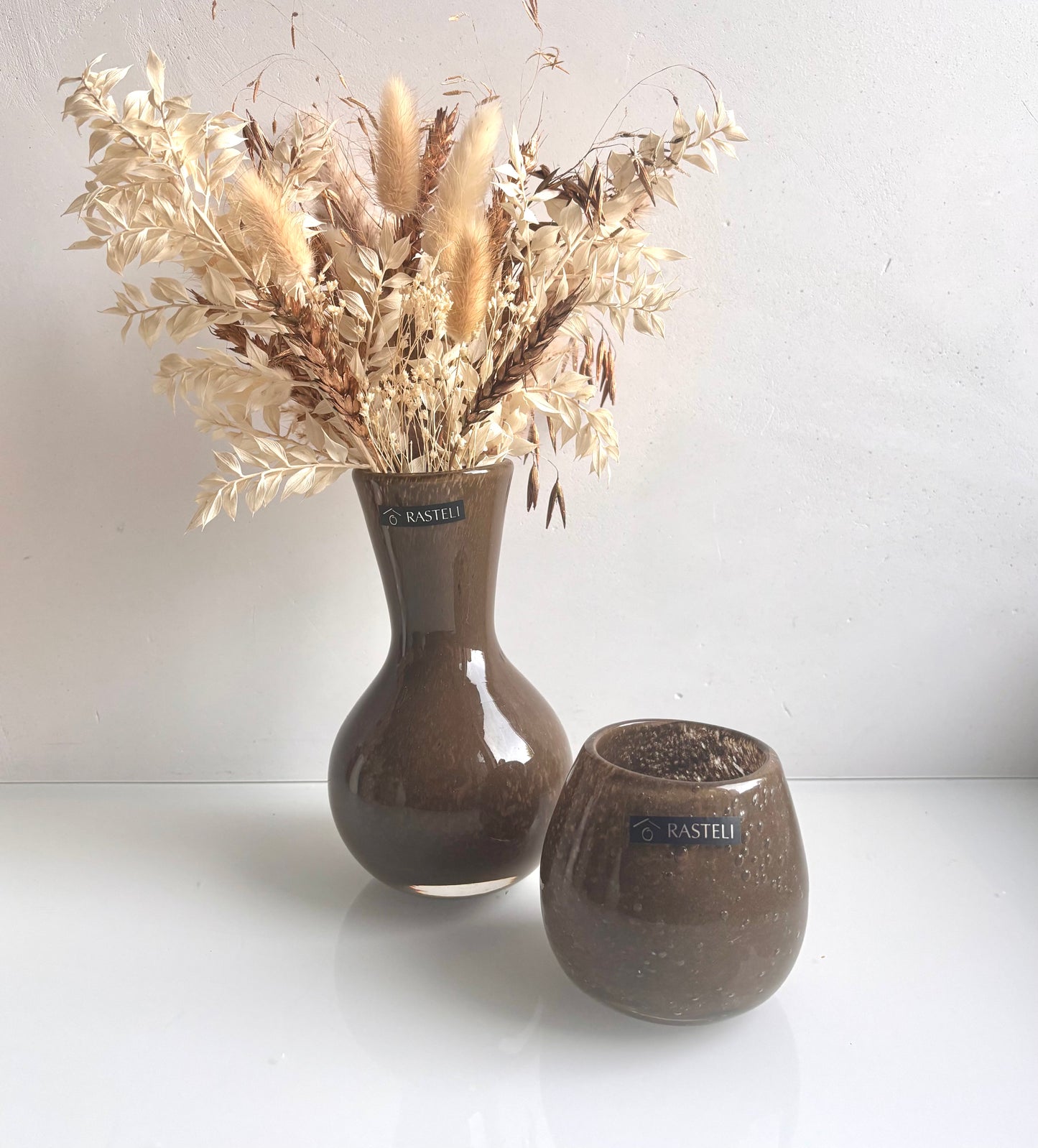 OK - Set rasteli vaas met theelichthouder bruin
kleuren: wit, rose gold, beige
H vaas met bloemen: 33cm
H theelichthouder: 8cm
Diameter: 5,50cm
€39,00
aparte theelicht eraf halen?
Voorraad: 1