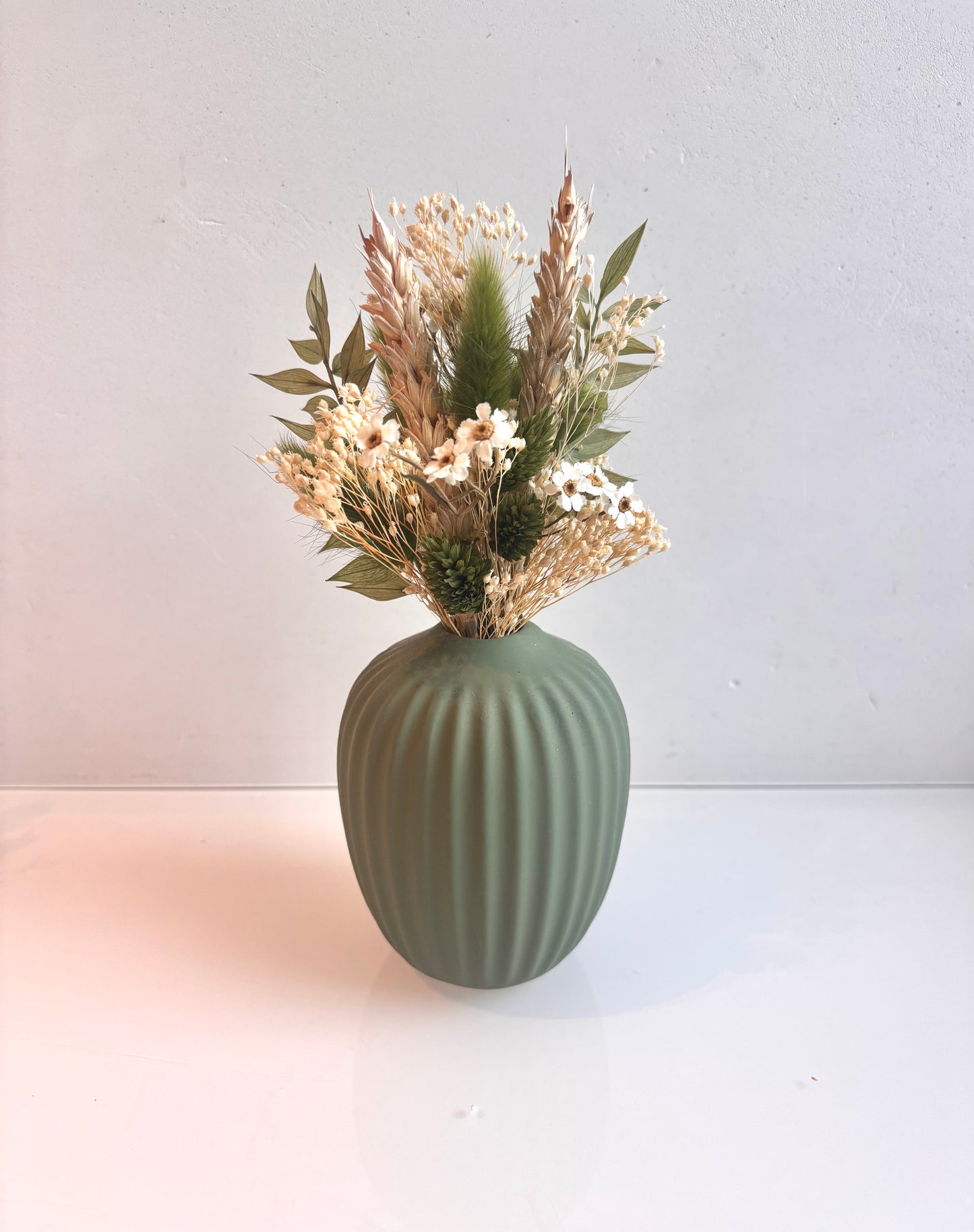 OK - Vaas groen geribbeld
Kleuren: groen, beige en wit
€23,50
H 20cm
Voorraad: 1