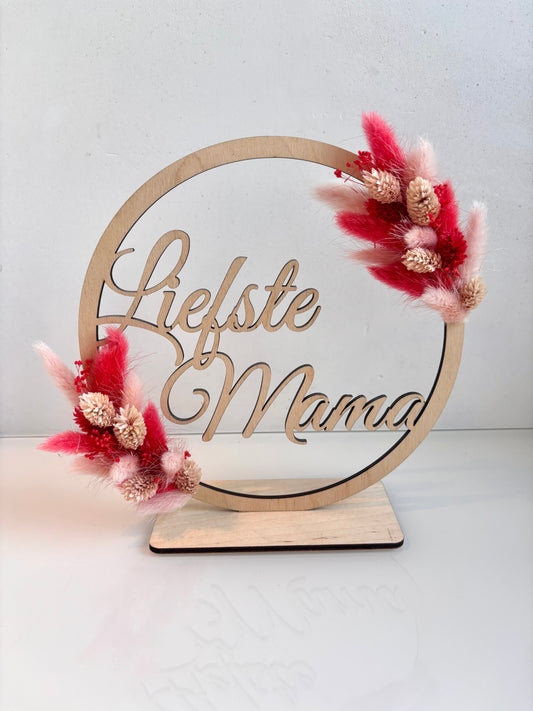 OK - Houten naamcirkel met liefste juf
Aan 2 zijden droogbloemen met felroze en lichtroze
Diameter 20cm met staander
Voorraad: 1
Collectie mama